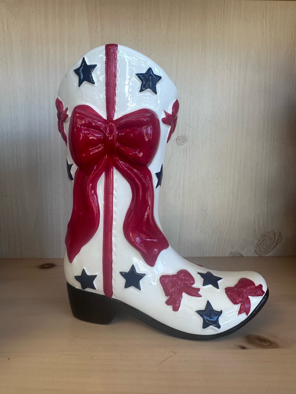 Decorative White Cowboy Boot Statue with Red Bows and Navy Stars